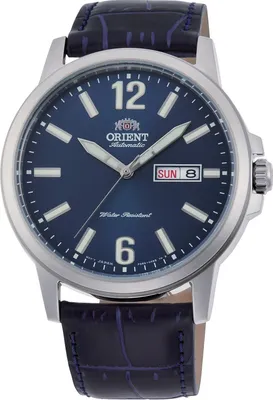 A close-up studio shot of an Orient men's watch with a blue dial and a dark blue leather strap.