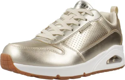 A single gold SKECHERS UNO-METALLIXS sneaker is shown from a side-front angle against a white background.