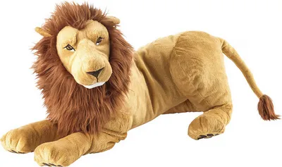 A plush toy lion lying down on a white background.
