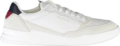 A white Tommy Hilfiger sneaker with navy and red accents on the heel.
