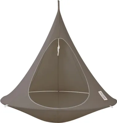 A taupe hanging chair or hammock.