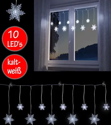 A product image showing snowflake-shaped LED lights hanging in a window and also displayed separately against a black background, with promotional text.