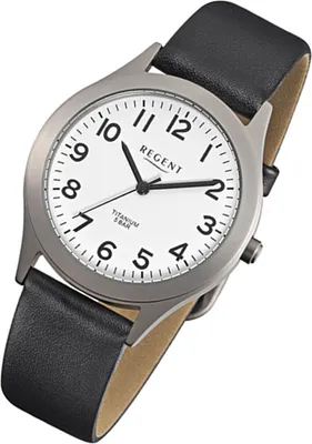 A close-up, angled view of a men's wristwatch with a white face and black leather strap.
