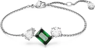 A close-up studio shot of a silver bracelet with three gemstones.