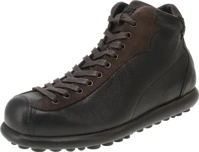 A single brown and black Camper shoe is shown against a white background.