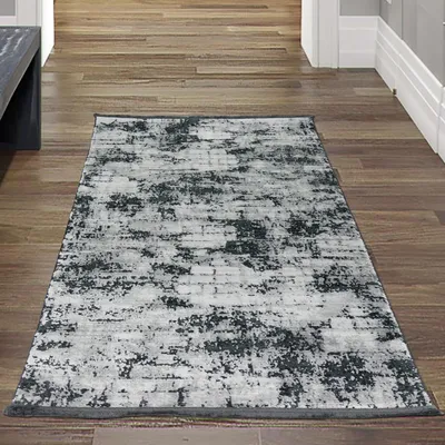 Obrázok produktu pre Moderný koberec do obývačky s abstraktným orientálnym vzorom v sivej farbe na čiernom pozadí rozmer - 80x150 cm