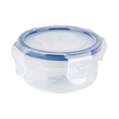 A clear, studio shot of a round, clear plastic food storage container with a blue lid and locking clasps, isolated on a white background.