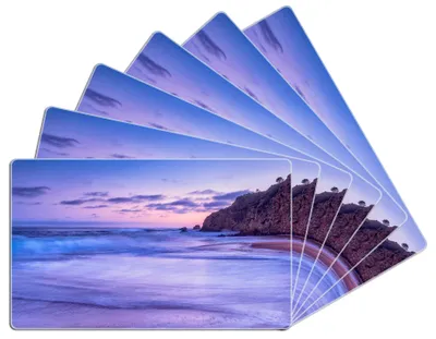 Produktbild von Wallario Frühstücksbrettchen 6er Set aus Glas, je 14 x 23 cm, mit rutschfesten Füßen, Motiv Kalifornischer Strand am Abend mit Felsenküste