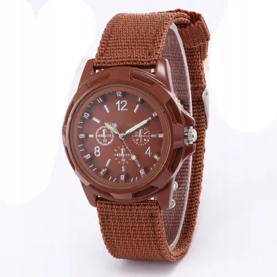 A close-up studio shot of a brown wristwatch with a nylon strap, displayed on a white background.