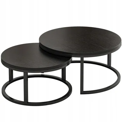 Two round nesting coffee tables with black wooden tops and black metal frames.
