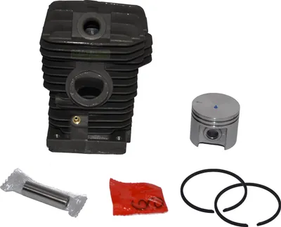 A set of chainsaw engine parts, including a cylinder, piston, wrist pin, and piston rings, laid out on a white background.