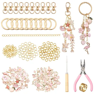Immagine prodotto di Kit per creare portachiavi a forma di lucidalabbra, con perline e ciondoli, confezione da 8 pezzi, colore rosa