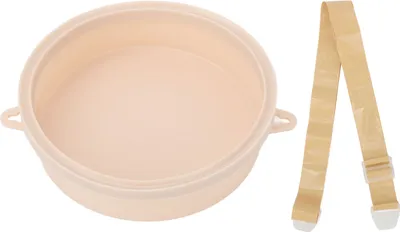 A beige stoma ostomy bath cover and a tan strap are shown against a white background.