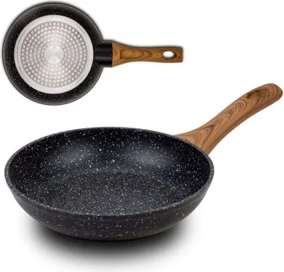 A frying pan with a wooden handle is shown from the side, with a view of its underside in the upper left corner.