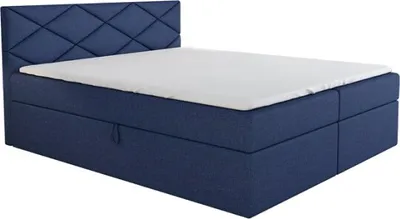 A blue boxspring bed with a white mattress and a diamond-stitched headboard, shown against a white background.