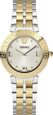 A studio shot of a gold and silver Versace women's watch against a white background.