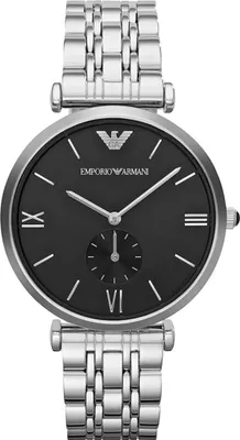 A close-up studio shot of an Emporio Armani watch.