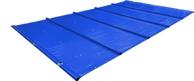 A blue pool cover laid out on a white background.