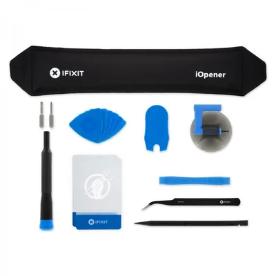 A collection of electronic repair tools laid out on a white background.