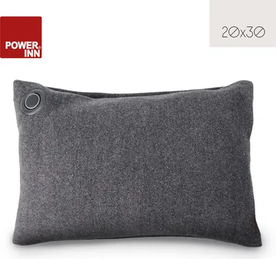 A dark gray rectangular heating pad with a metallic grommet on the top left corner, presented on a white background.
