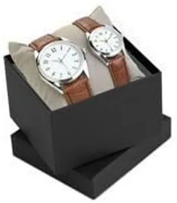 A pair of watches in a black gift box.
