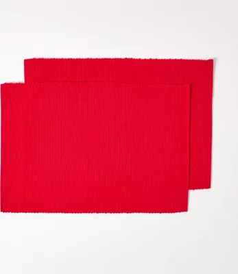 Two red placemats are shown on a white background.
