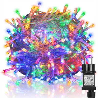 A tangled ball of colorful LED string lights with a power adapter.