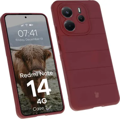 A smartphone with a burgundy case and a close-up of a highland cow on the screen.