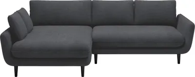 A dark gray sectional sofa is shown from the front on a white background.