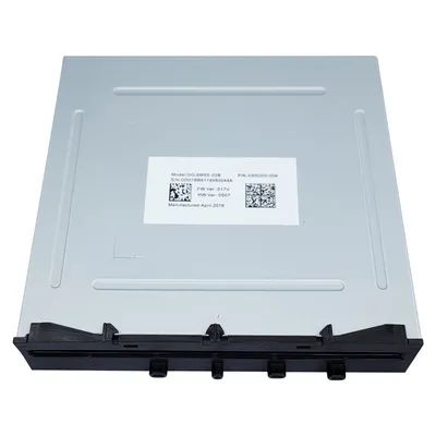 A top-down view of a silver and black optical drive with a label on it.