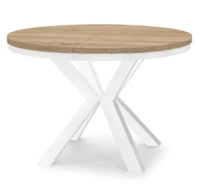 A round dining table with a wood-effect top and a white geometric base, presented on a white background.