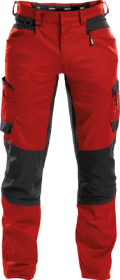 A pair of red and black work pants are shown against a white background.