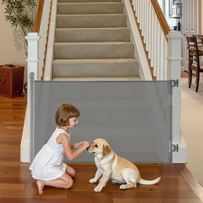 Produktbild von Einziehbares Treppenschutzgitter - Babygitter & Hundegitter - Ausziehbar bis 145 cm, 98 cm Höhe - Sicherheitsschloss - Netzgewebe - Für Treppen & Flure Innen/Außen - Grau