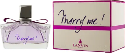 A perfume bottle and its box are displayed side-by-side against a white background.