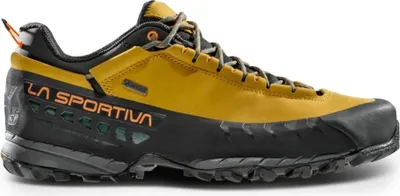 A single hiking shoe is shown against a white background.