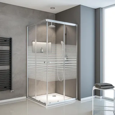 A modern bathroom with a glass shower enclosure.