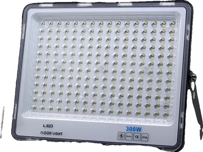 A close-up studio shot of a black and white LED floodlight.