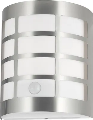 A close-up studio shot of a modern outdoor wall light with a brushed silver finish and white frosted glass panels. The light fixture has a curved shape and features a motion sensor.