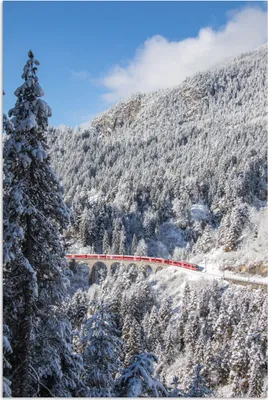 Produktbild von MuchoWow® Poster Mit dem Zug durch die Winterlandschaft der Schweiz 20x30 cm - Papierdruck