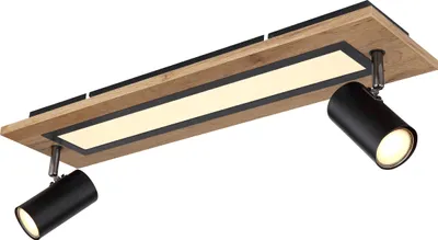 A modern ceiling light fixture with a wooden base and two black spotlights.
