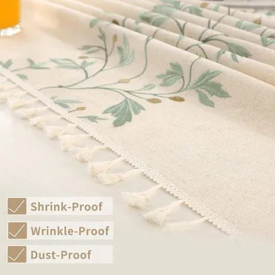 Produktbild von Tischdecke mit Natürlicher Eleganz und Grünen Stickblättern - Beige