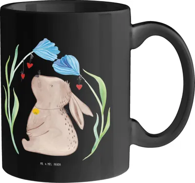 Produktbild von Mr. & Mrs. Panda Kaffeetasse Hase Blume - Schwarz - Geschenk, Tasse, Kaninchen, Ostern, Keramikbecher, mit Spruch, Trinkbecher, Geburt, Geburtstag, Schwangerschaft, Pott