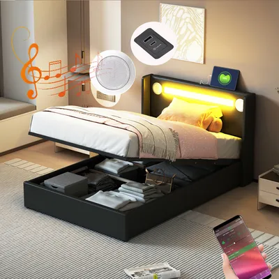 Produktbild von Flieks čalúnená posteľ 90x200cm s USB a Bluetooth prehrávačom, posteľ s boxovou pružinou, jednolôžko s LED a lamelovým roštom, úložný priestor, posteľ pre mladých, PU, čierna
