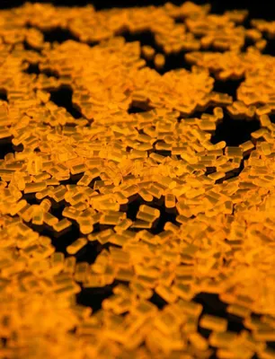 Produktbild von 25kg PSYWORK Schwarzlicht Acrylglas-Granulat Orange