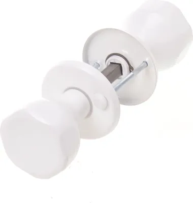 A white doorknob set with its internal mechanism and rosettes, presented against a white background.