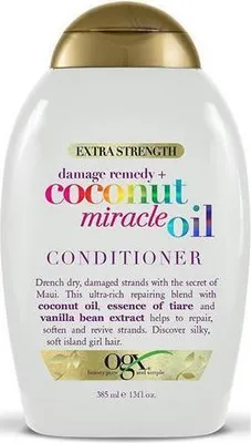 Image de OGX Damage Remedy + Coconut Miracle Oil Conditioner pour cheveux secs et abîmés, 385 ml