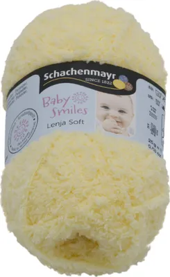 A ball of yellow yarn with a label wrapped around it.