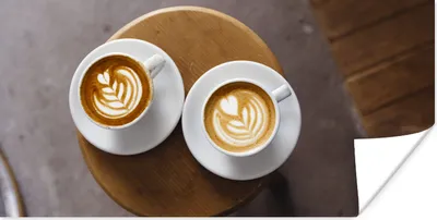 Produktbild von MuchoWow® Poster Zwei Kaffeetassen mit Latte Art werden von oben gezeigt 150x75 cm - ohne Rahmen