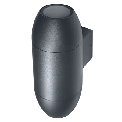 A dark gray outdoor wall lamp with a cylindrical body and rounded top and bottom, mounted on a black rectangular bracket.