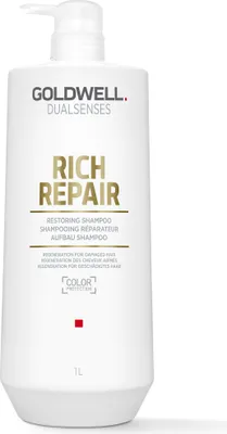 A white bottle of Goldwell Dualsenses Rich Repair Restoring Shampoo with a pump dispenser.